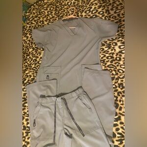 Light grey. Carhartt scrub set. Medium sized top. Regular small bottoms.